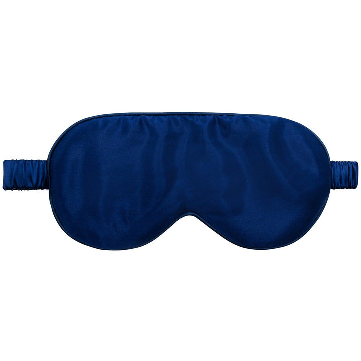 Close-up of the navy blue silk eye mask with elastic strap