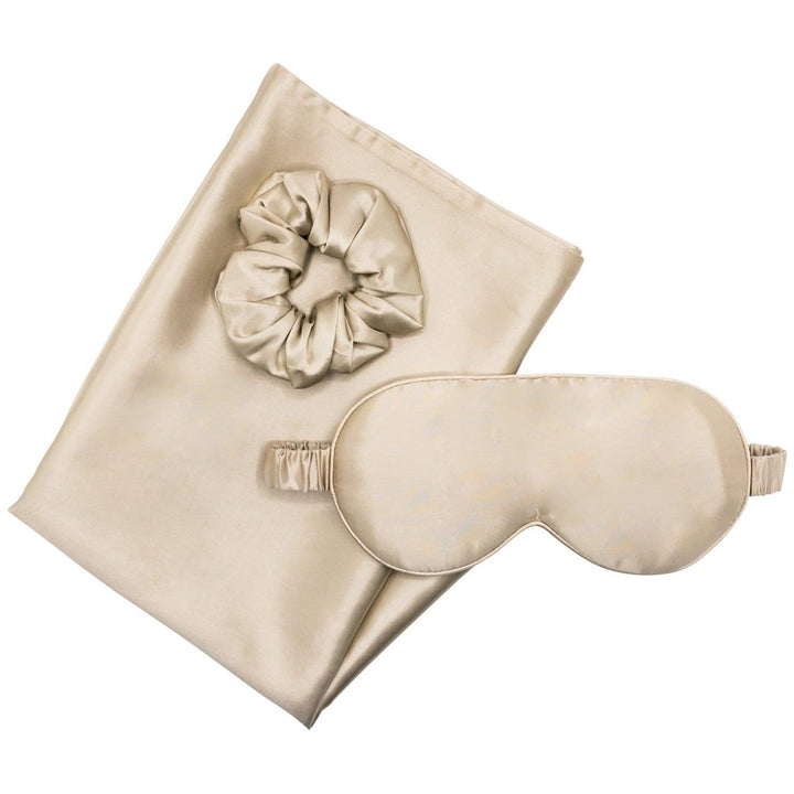 Silk pillowcase gift set featuring champagne moon flower eye masks and scrunchies